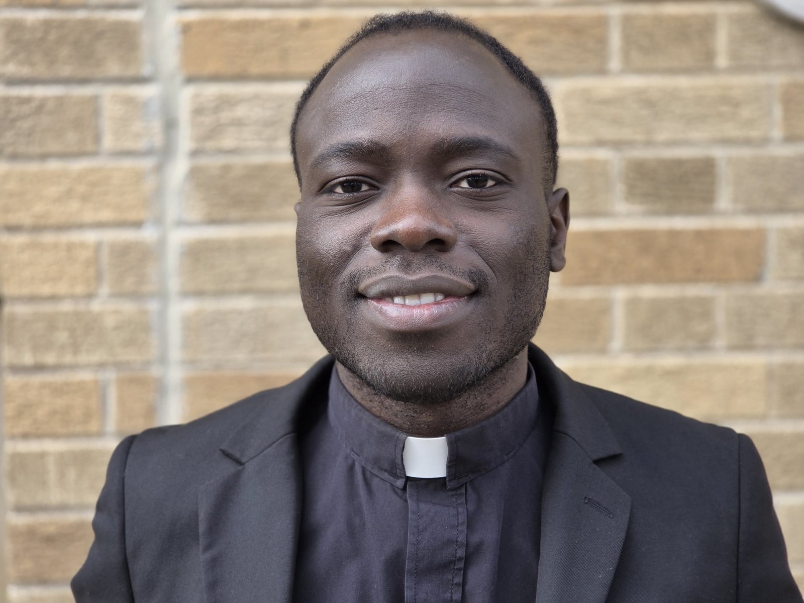 Seminarian Giuseppe Njualem, founder of Catholic Funeral Program